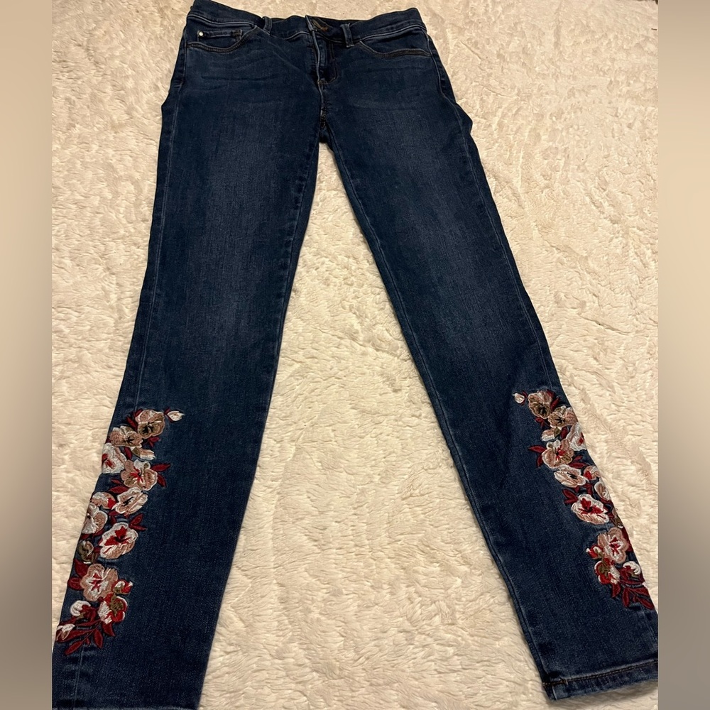 Ann Taylor jean with embroidery design on legs. Size 2.